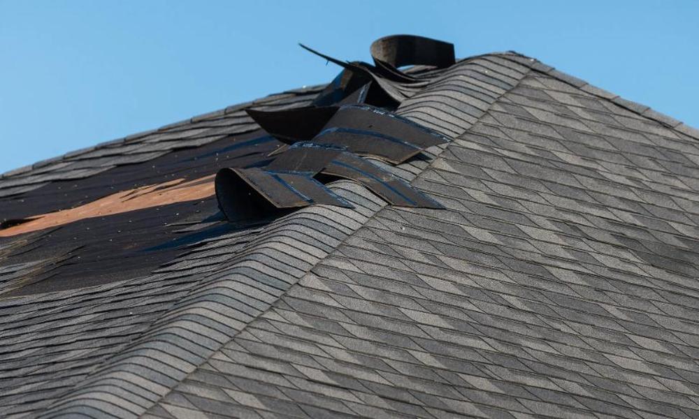 Recovering from the Storm Repairing Wind-Damaged Roofs and Preventing Future Issues